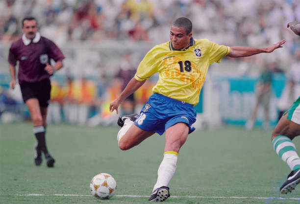 Ronaldo Nazário in a yellow Brazil #18 jersey