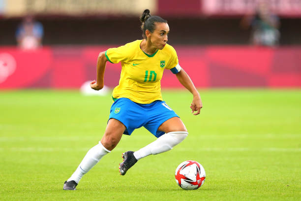 Marta Vieira da Silva dribbling a soccer ball